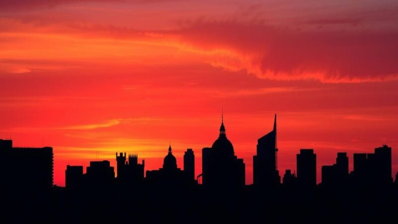 Silhouetted cityscape with diverse architectural styles under a sunset sky, reflecting diplomacy and global discussions.